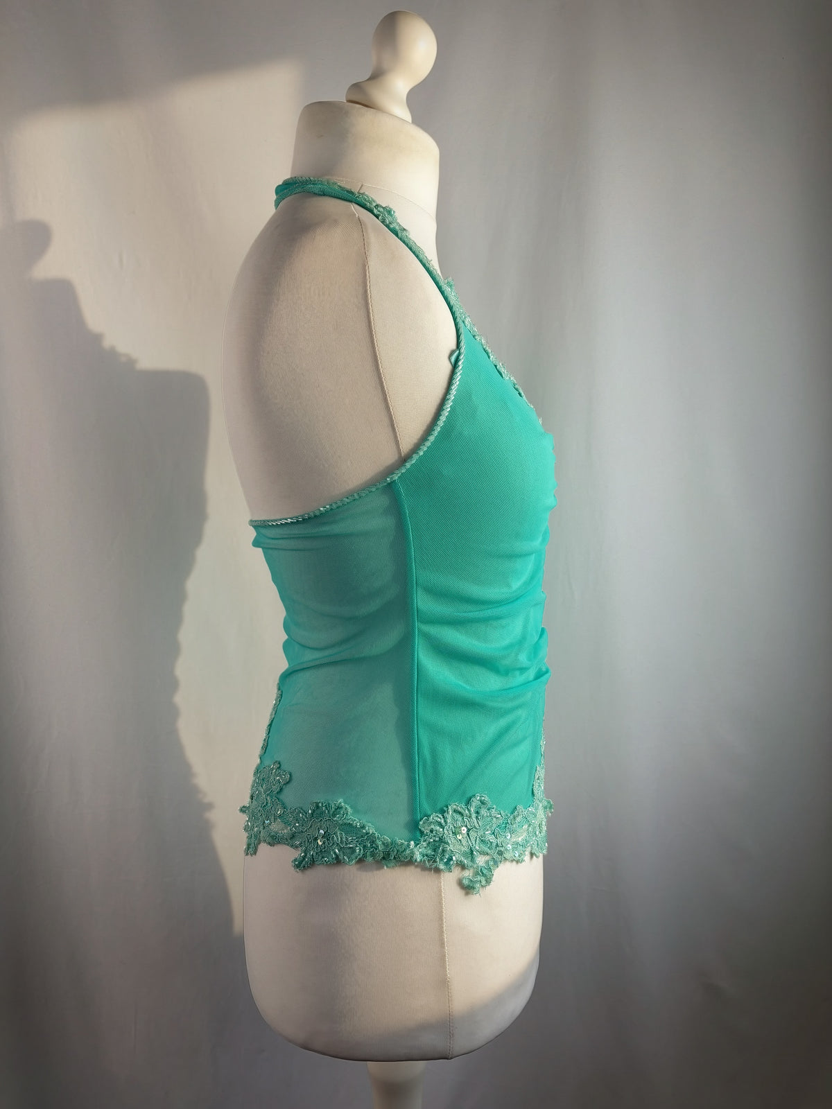 Bright blue ruched aftershock halter neck with beaded lace details