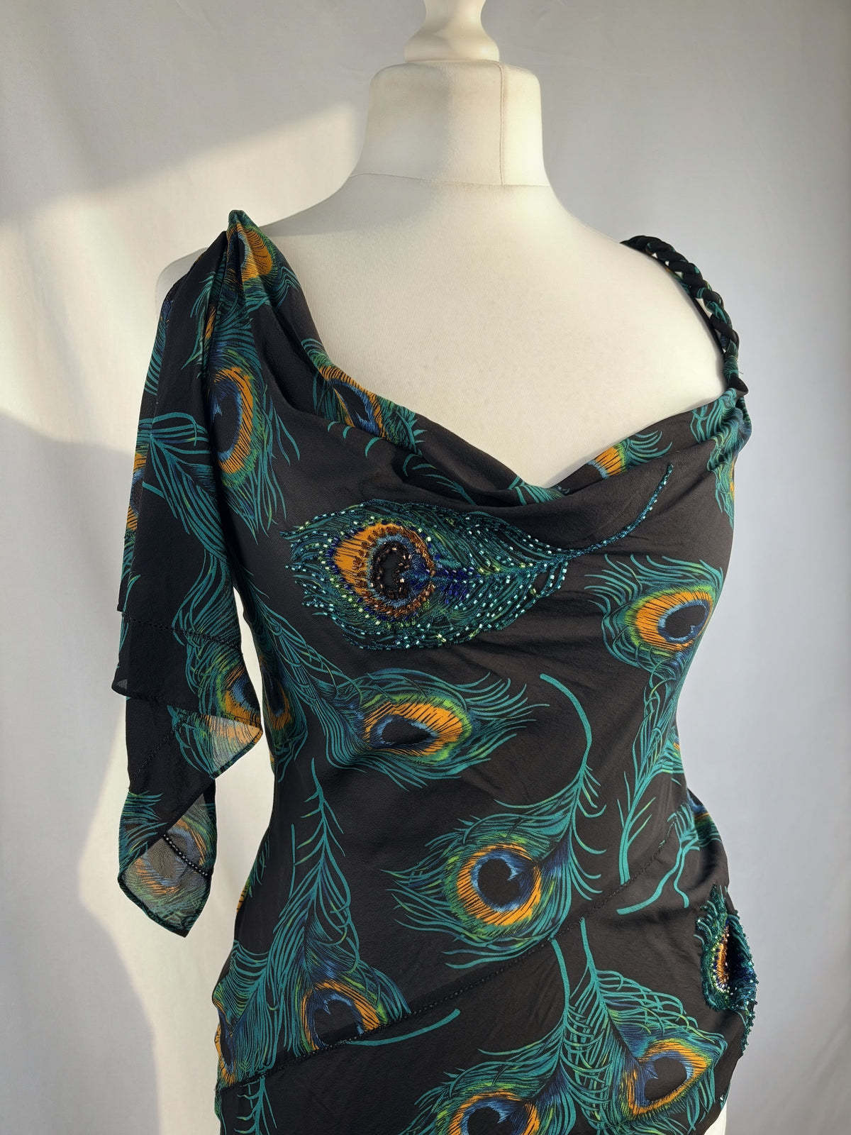 Black sheer silk peacock detailed cross back top with embellishments