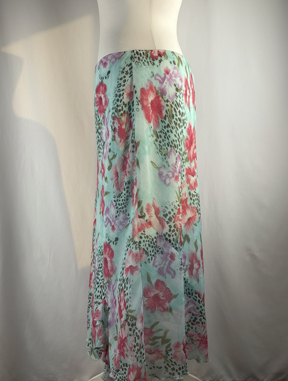 Light blue floral/ animal print skirt with ruffle detail