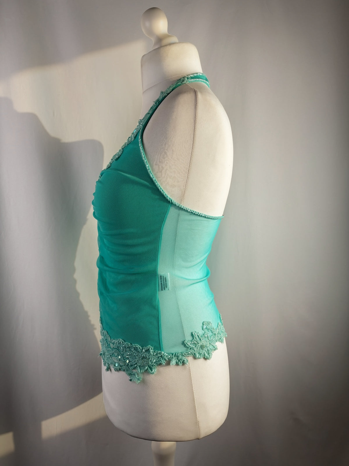 Bright blue ruched aftershock halter neck with beaded lace details