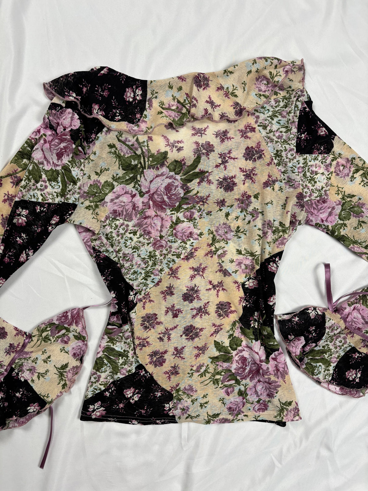 Floral patchwork long sleeve top with bow cuff detail