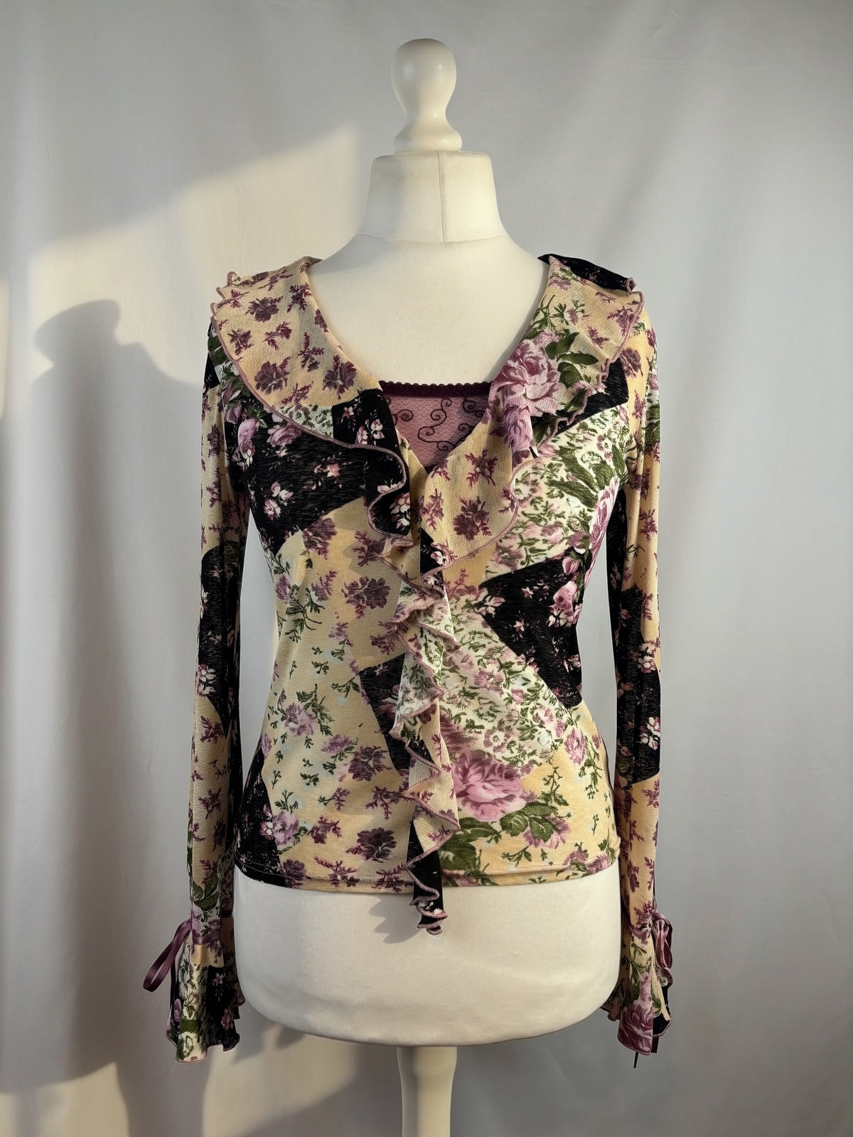 Floral patchwork long sleeve top with bow cuff detail