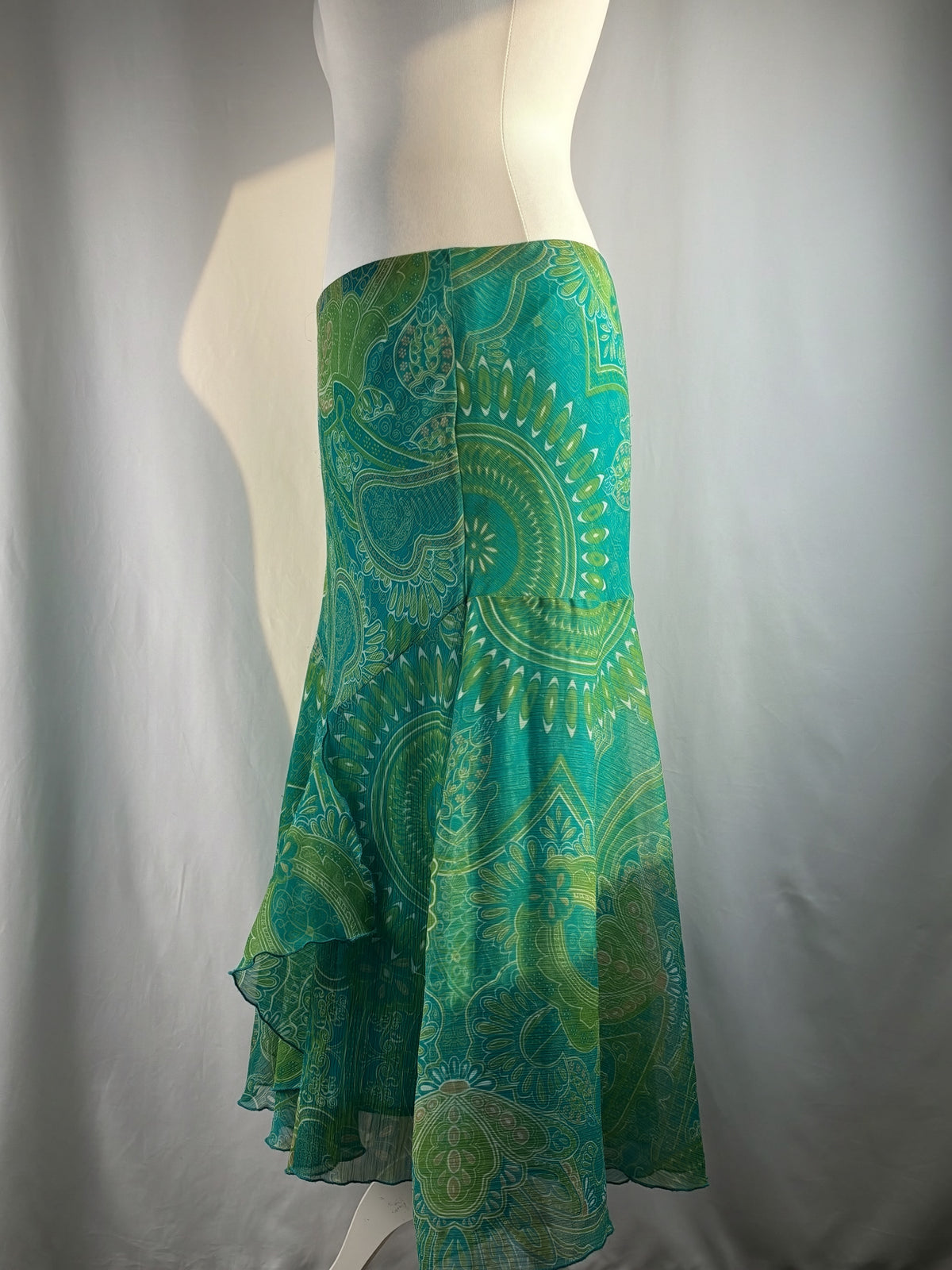 Green and blue tropical ruffle detailed midi skirt