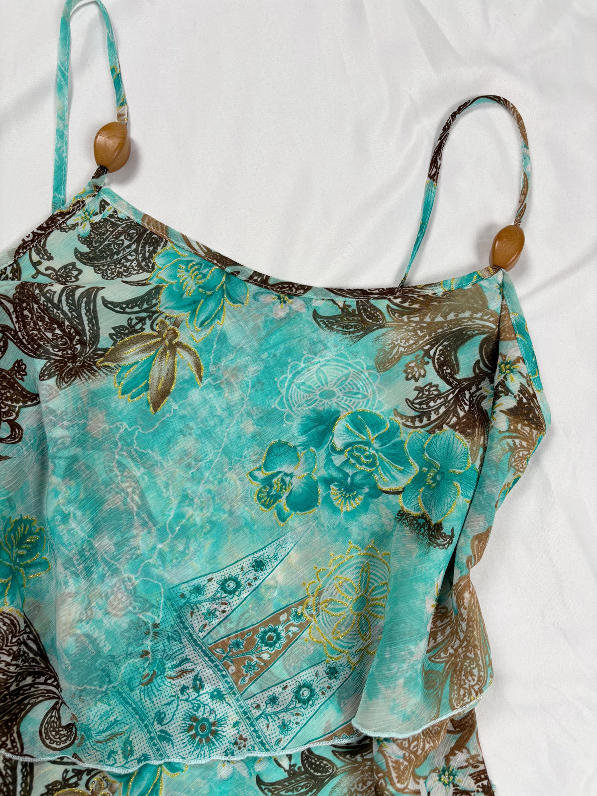 Blue and brown floral tiered ruffle cami with wooden bead details