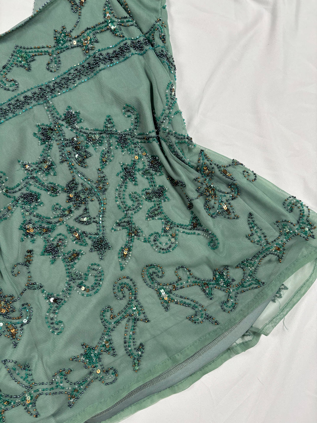 Green heavily beaded v neck fairy top