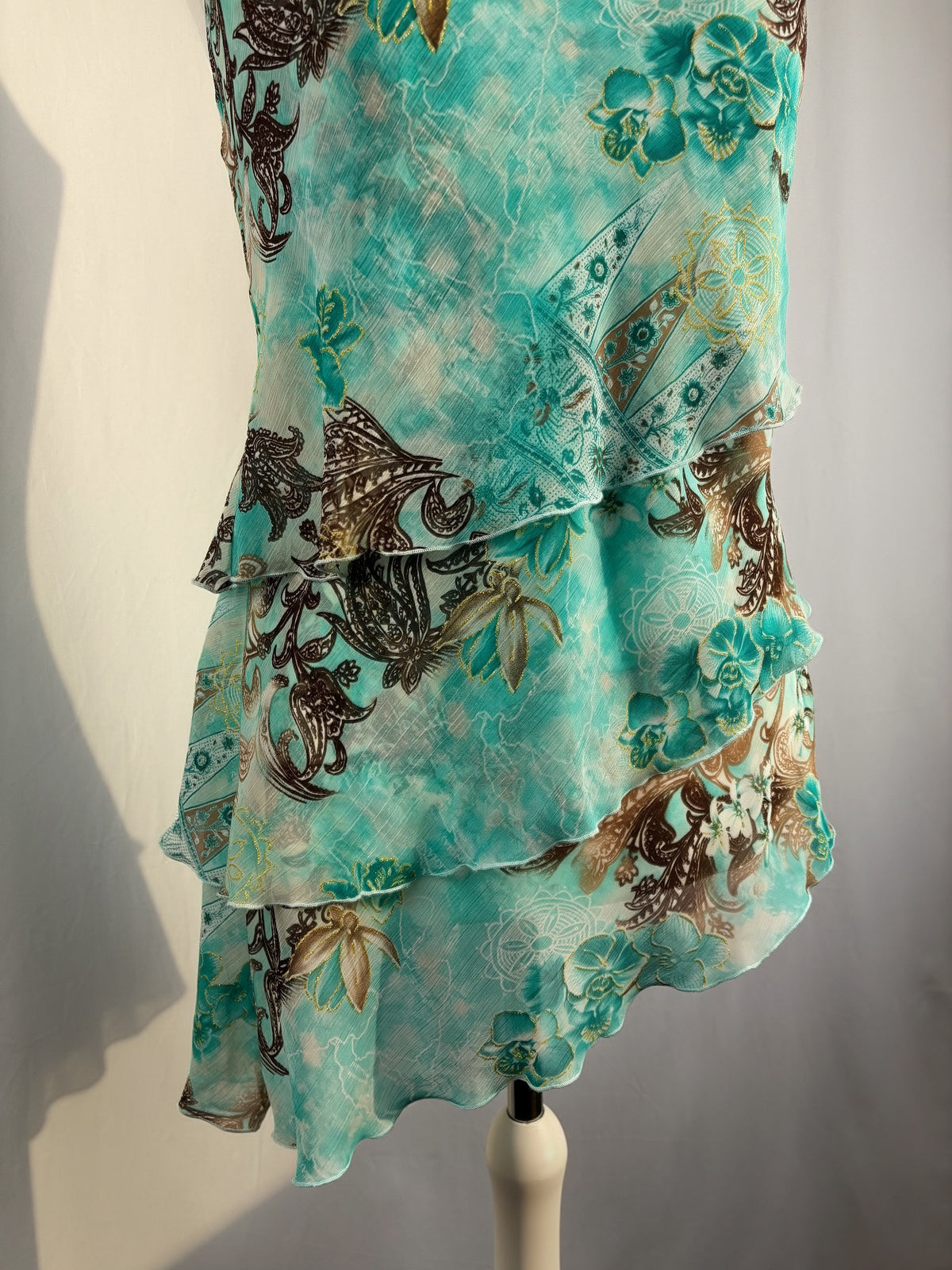 Blue and brown floral tiered ruffle cami with wooden bead details