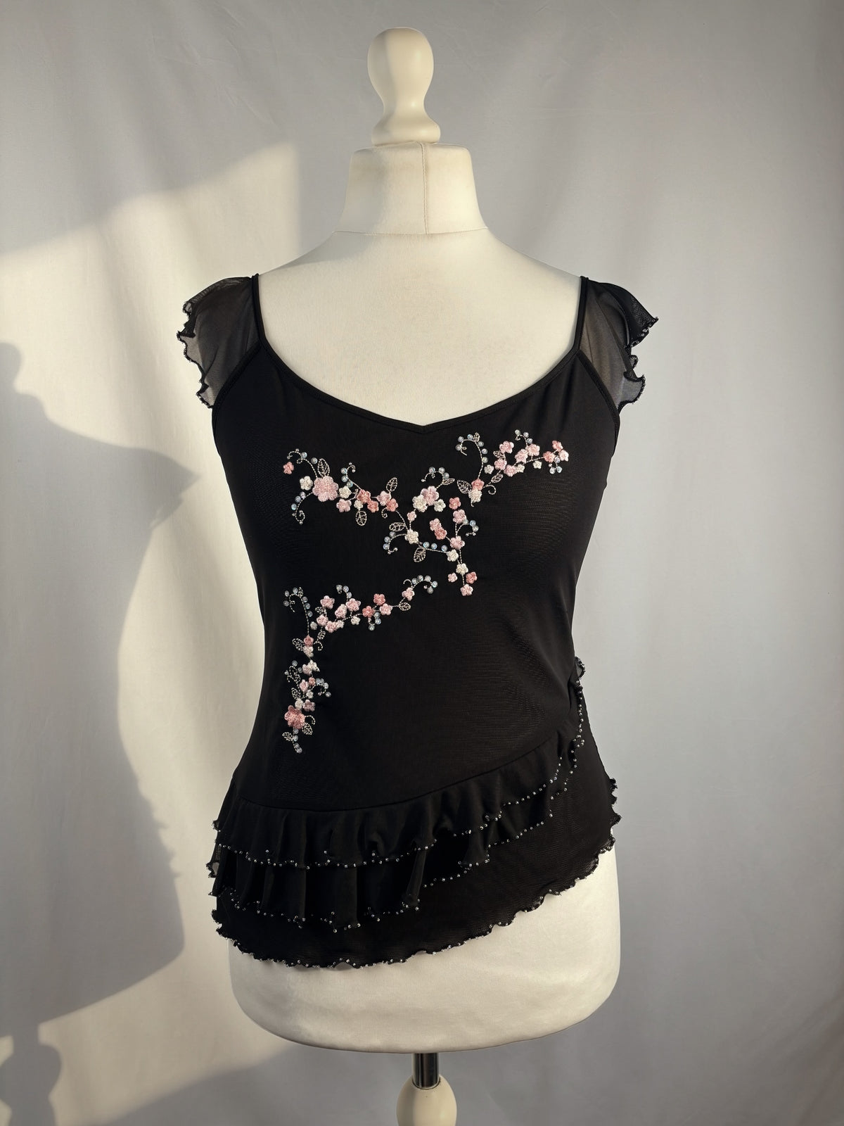 Black milkmaid neckline top with embellished cherry blossom details