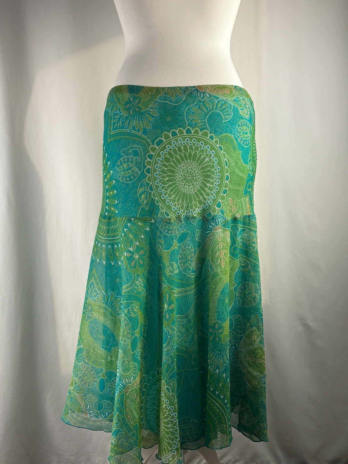 Green and blue tropical ruffle detailed midi skirt