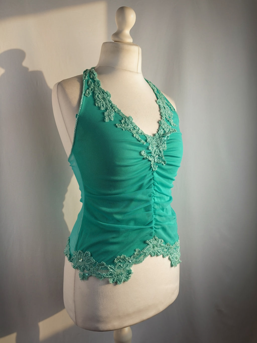 Bright blue ruched aftershock halter neck with beaded lace details