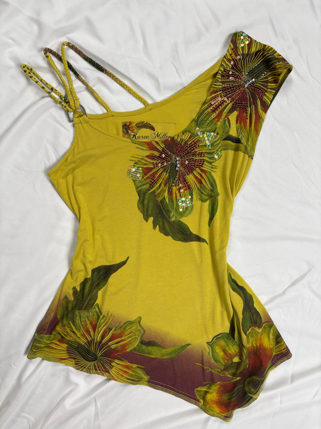 Green asymmetrical tropical print embellished top with shoulder strap detail