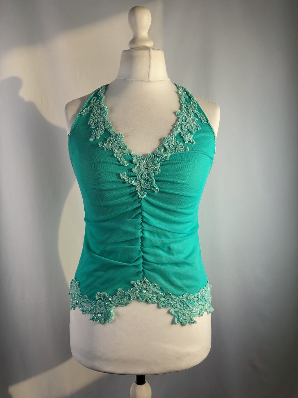 Bright blue ruched aftershock halter neck with beaded lace details