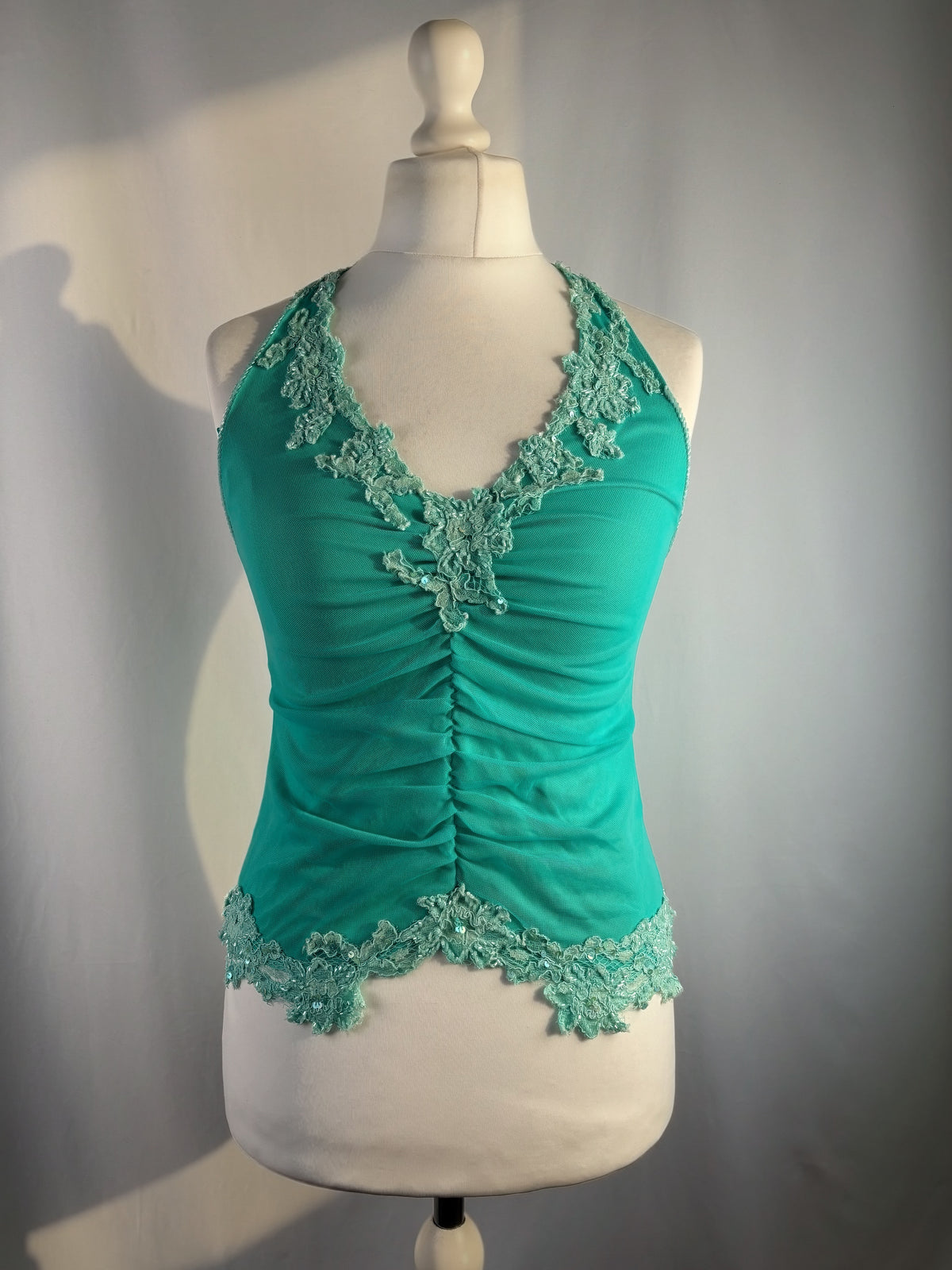 Bright blue ruched aftershock halter neck with beaded lace details