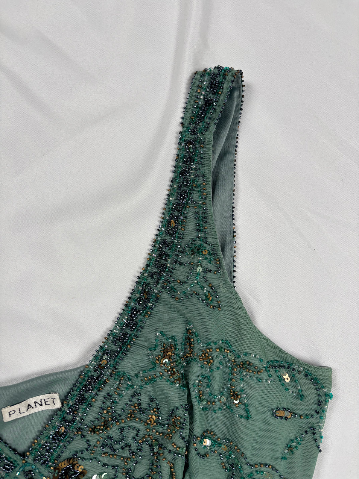 Green heavily beaded v neck fairy top