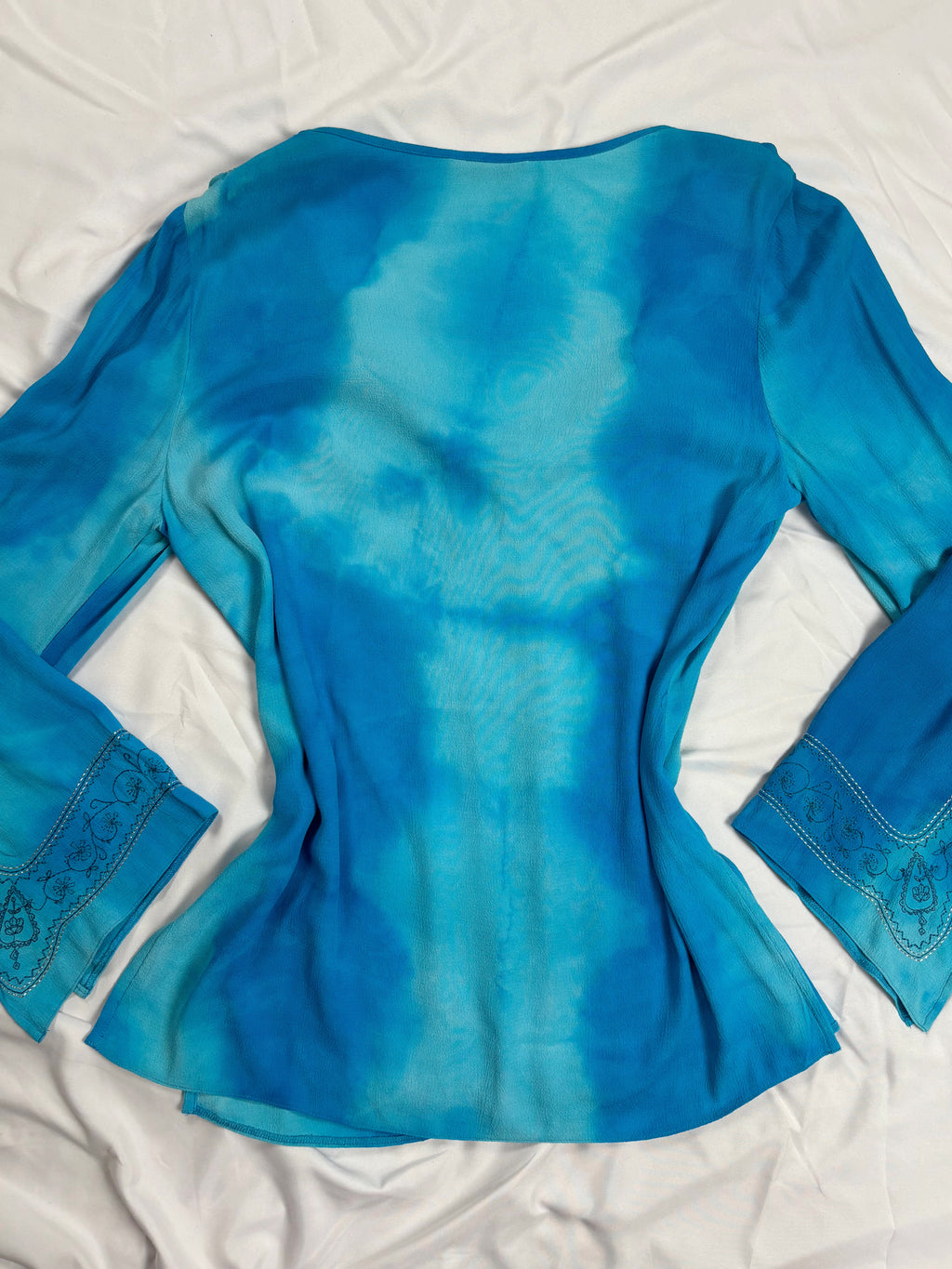 Blue ombré long sleeve top with embroidery details