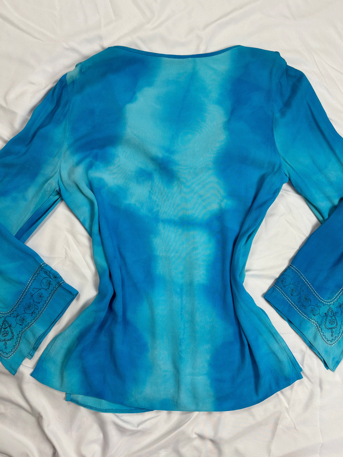 Blue ombré long sleeve top with embroidery details