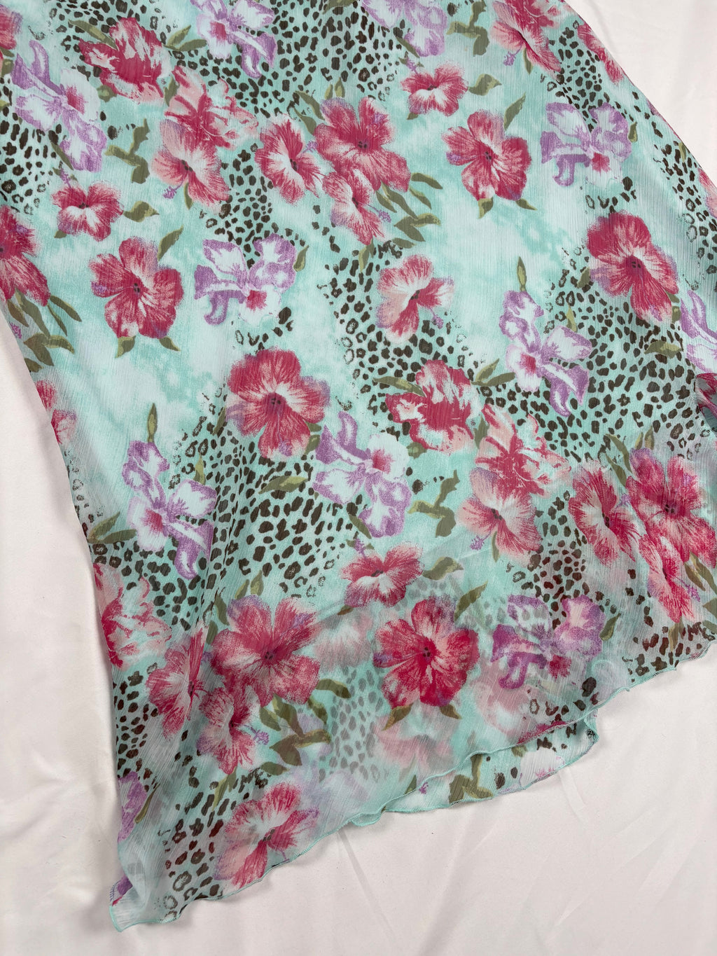 Light blue floral/ animal print skirt with ruffle detail
