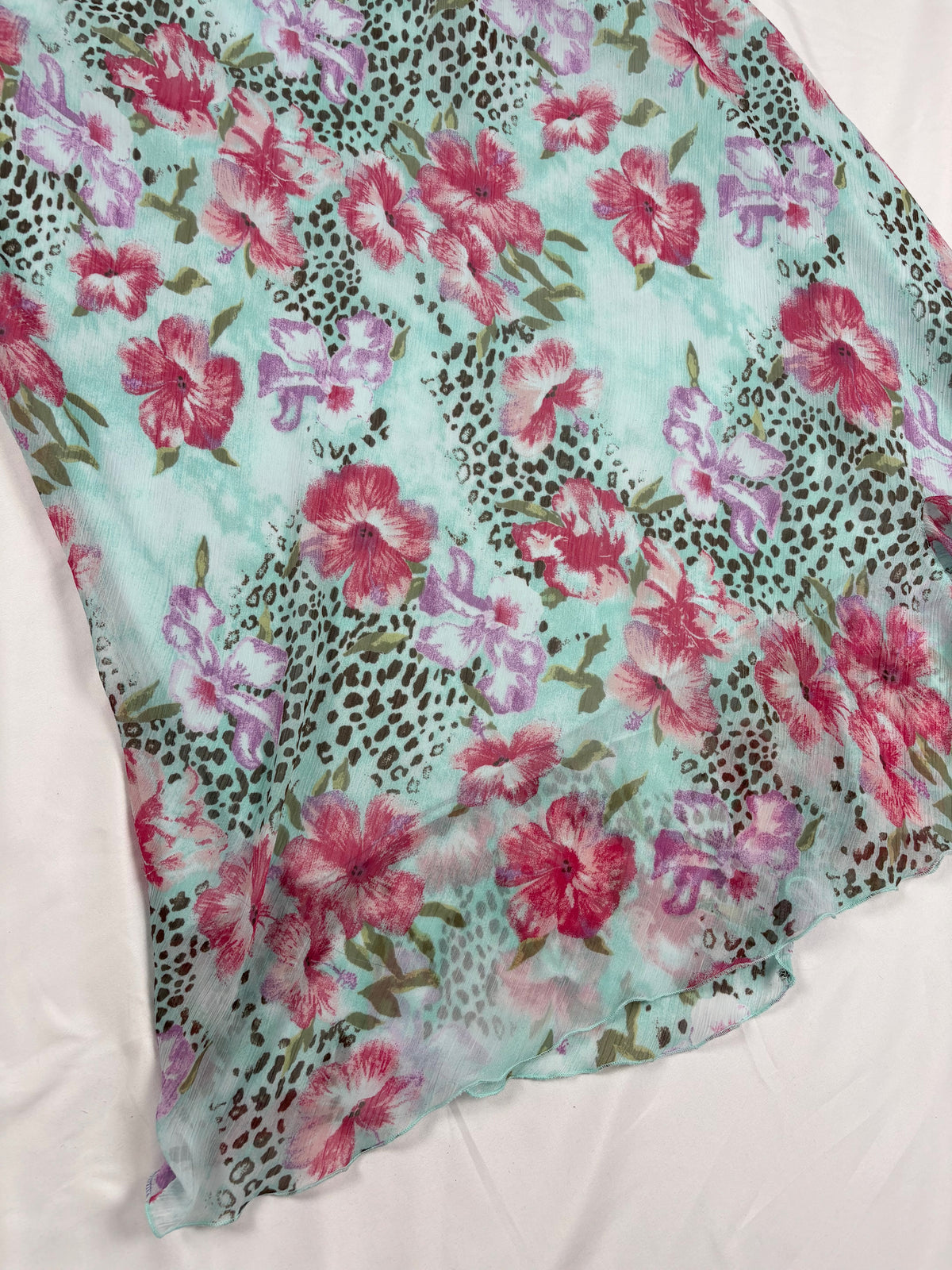 Light blue floral/ animal print skirt with ruffle detail